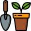 Glyph icon trowel and plant in ceramic pot